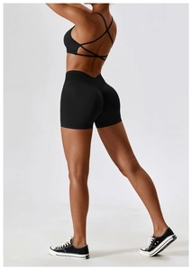 Close-up of black high-waisted seamless yoga shorts with scrunch butt lifting detail