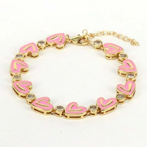 Detail of gold heart bracelet with pink enamel charms and clear zircon stone accents