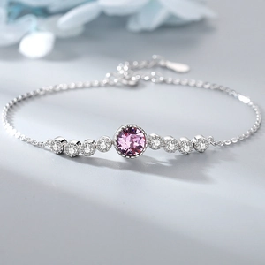 Detail of S925 sterling silver bracelet with purple round stone and white zircon stones