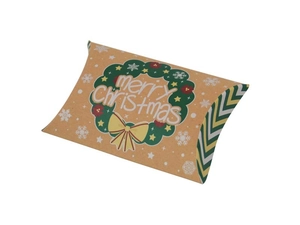 Detail of kraft paper Christmas pillow candy box with wreath and merry Christmas print