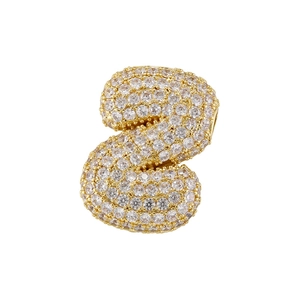 Macro shot of gold-plated letter S pendant encrusted with clear cubic zirconia stones