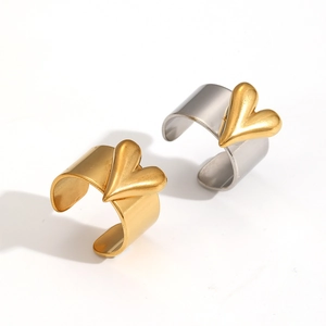 Two-tone heart rings in gold and silver finish with adjustable open band design