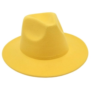 Macro view of bright yellow wool felt fedora showing texture and crown stitching details