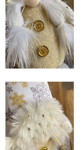 Close-up of Faceless Gnome doll with gold glitter body and snowflake patterned hat