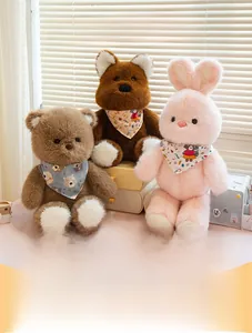 Detailed view of soft plush bear, dog and rabbit toys with cartoon scarves in a cozy setting