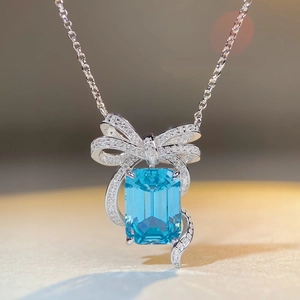 Elegant S925 silver necklace with rectangular aquamarine pendant and diamond bow knot