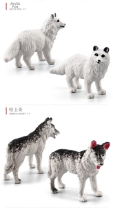 Detailed view of Arctic Fox and Siberian Husky figurines with realistic fur textures