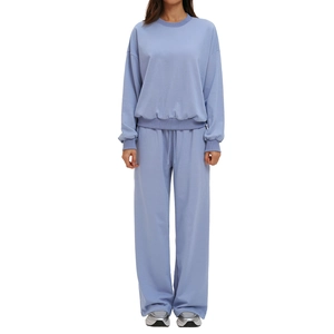 Women's two-piece periwinkle blue tracksuit with drop shoulder sweatshirt and wide leg pants