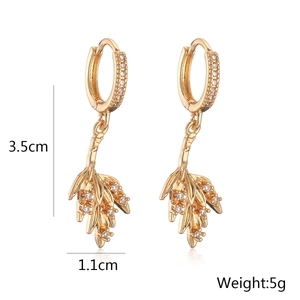 Detailed view of gold plated leaf earrings with sparkling cubic zirconia and dimensions