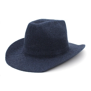 Detail of navy blue hand-knitted Panama hat with wide brim and cattleman crown design