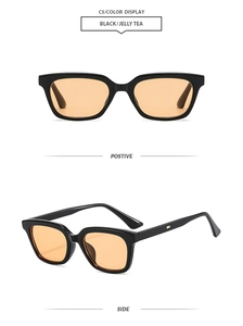 Detail view of square black sunglasses with jelly tea lenses and silver stud hinges