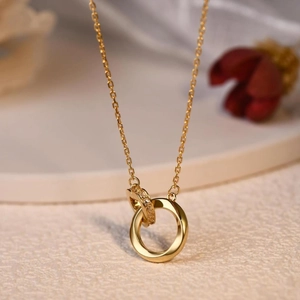 18K gold double ring Mobius pendant necklace with sparkling cubic zirconia inlay