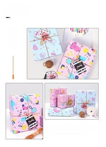 Baby themed gift wrapping paper set with cartoon prints, jute twine and gift tags