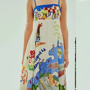 Detail of artistic graffiti print on breathable cotton-linen dress with spaghetti straps