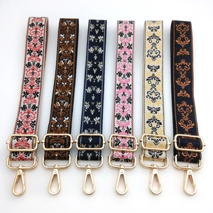Adjustable jacquard bag straps with colorful floral patterns and gold metal hooks