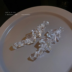 Irregular clear acrylic ice-cube drop earrings with silver pins for a modern look