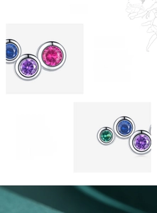 Macro detail of 925 sterling silver rainbow earrings featuring 5A colorful cubic zirconia