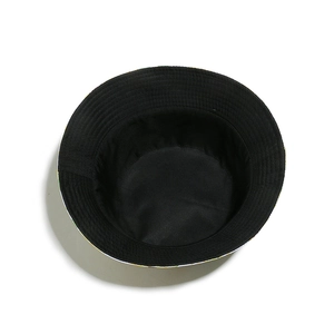 Close-up of the black interior lining and precision stitching of the white sunflower bucket hat