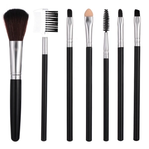 Set of 7 portable professional makeup brushes with black handles and silver ferrules
