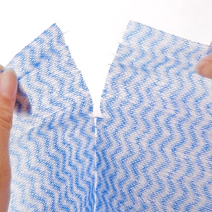 Disposable blue and white wave pattern cleaning cloth with easy-tear perforated line