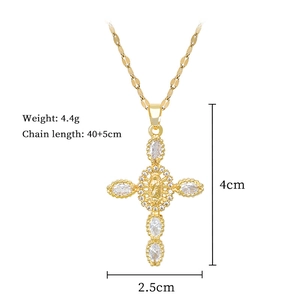 Detailed specs of gold cross pendant with Virgin Mary relief and full diamond inlay