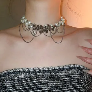 Elegant French double-layer pearl necklace with silver butterfly charms for women