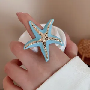 Blue enamel starfish open ring in gold plated finish for bohemian beach style jewelry