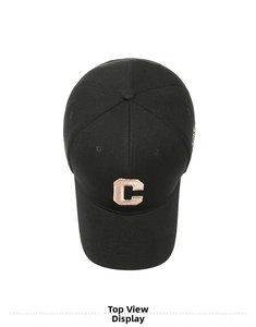Close-up of premium 3D embroidered letter C on a black cotton baseball cap detail