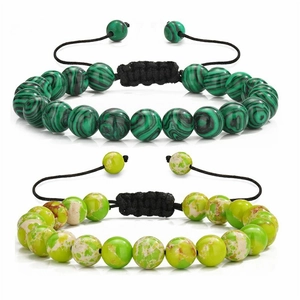 Detail of 8mm natural stone beaded bracelets with adjustable cord and malachite texture