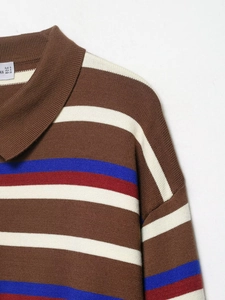 Close-up of brown striped knitted polo neck with size label and fine texture