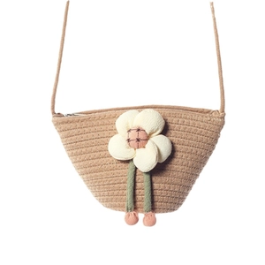 Mini shell-shaped woven cotton crossbody bag with 3D sunflower and pink pompons