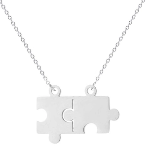 Two interlocking stainless steel puzzle piece pendants on fine chains for couples