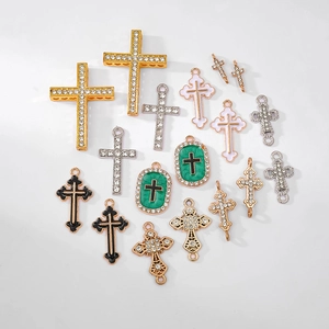 Assorted gold and silver cross pendants with rhinestones and enamel for DIY jewelry