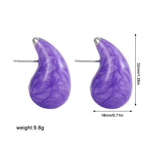 Detail view of purple hollow teardrop earrings with dimensions 32mm by 18mm and 9.8g weight