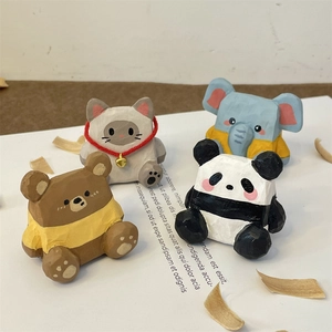 Figurines d'animaux en bois sculptées à la main comprenant ours, chat, éléphant et panda