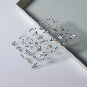 Detailed view of 5D daisy nail stickers model FEB-510 with embossed camomile flowers