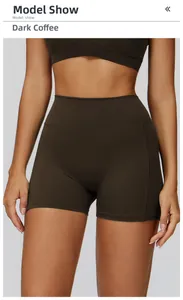 Macro detail of the dark coffee high-waisted yoga shorts with wide waistband and stitching