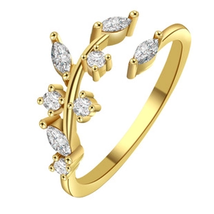 Close-up of golden leaf open ring with marquise and round clear crystal inlay details