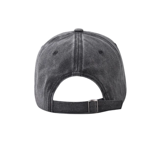 Detail view of washed cotton baseball cap with adjustable metal buckle and vintage texture