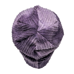 Top view of purple tie-dye beanie showing intricate cable knit texture and twisted top crown