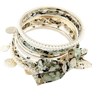 Bohemian multilayer bracelet set featuring floral bow fabric and faux pearls with gold charms