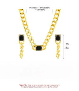 Detail of chunky gold chain necklace and black gem earrings with dimension markings