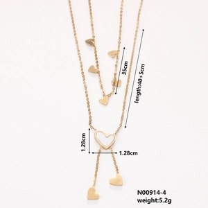 Detailed view of layered gold heart necklace with dimensions 35cm and 40+5cm length