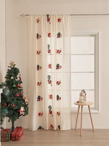 Detailed Santa Claus embroidery on creamy white lace curtain with wavy scalloped edges