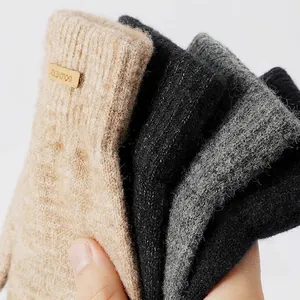 Winter thermal knit gloves for men with touchscreen grip and windproof fleece lining