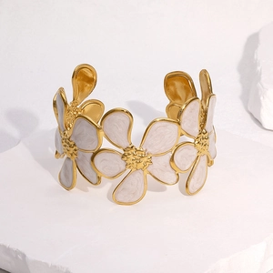 Bracelet jonc ouvert en acier inoxydable plaqué or 18k avec motifs de fleurs marguerites