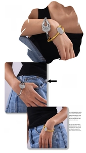 Detail shot of chic gold and silver titanium steel bracelets with paved white zircons