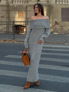 Detail shot of the vertical ribbed texture on this off-shoulder knitted long gray dress