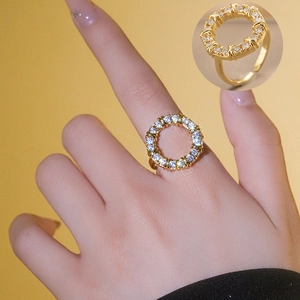 Elegant gold plated open ring with pave white zircon on finger for women