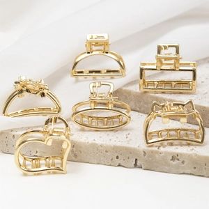 Elegant gold metal hair claw clips set in various geometric shapes for women